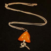 Vintage pressed amber pendant on chain